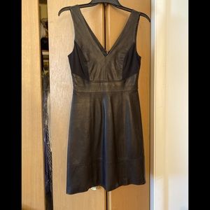 Bebe $DROP Blk Lthr Mini XS - v-neck front & back